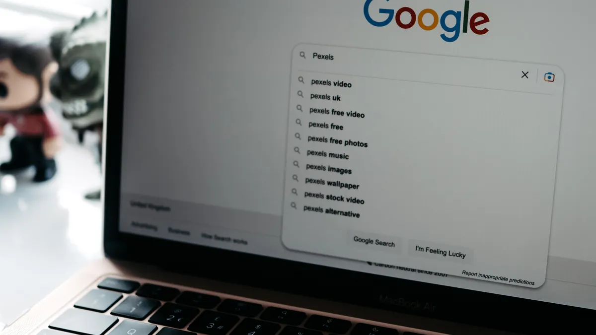Bing vs Google ranking: key differences SEOs must know when optimizing — Photo of a Laptop Screen with Google Main Page 