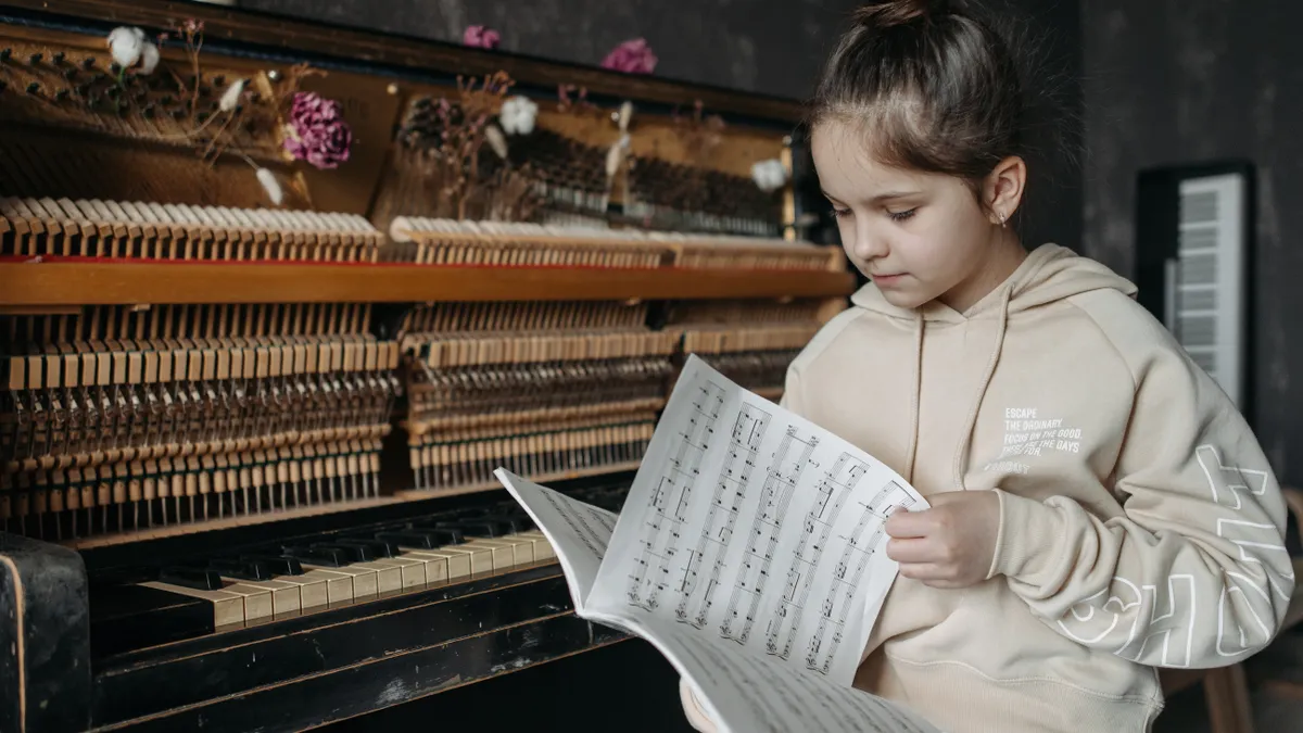 On‑page optimization tuned for Bing: titles, schema, synonyms and spelling — A Girl Flipping the Pages of the Music Book